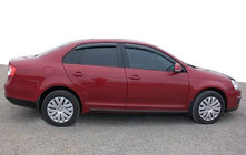 Volkswagen Jetta 2006–2011 Deflektorji oken (4 kosi, SIM) fotografija 1