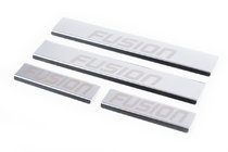 Ford Fusion 2002–2012 Obloge pragov Carmos (4-delni komplet, inox) fotografija 1