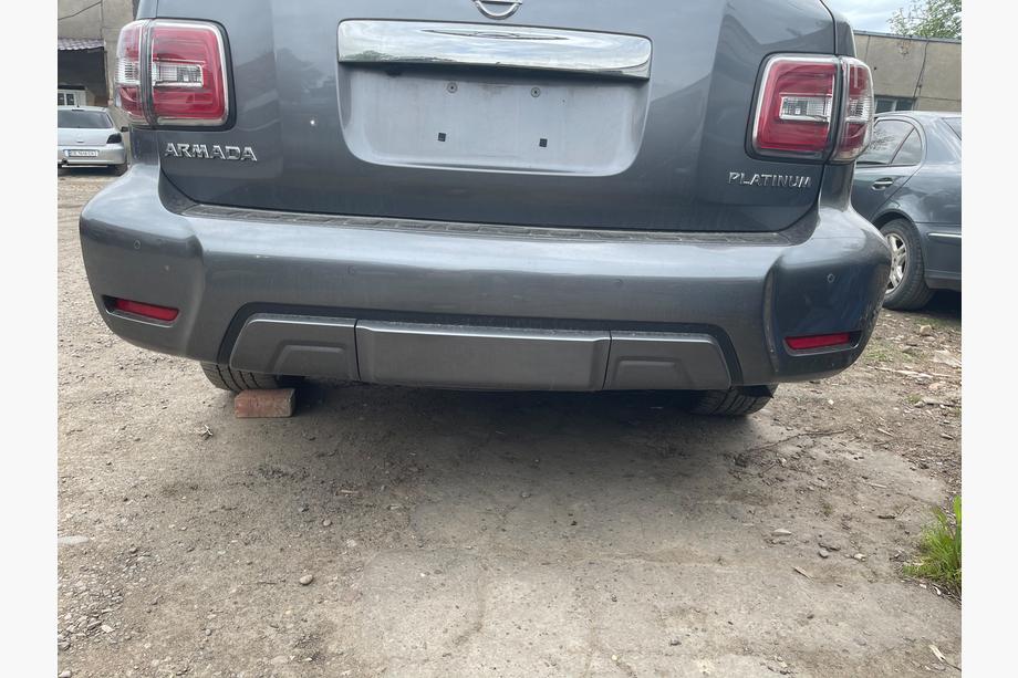 Nissan Armada 2016–2024 Zadnji odbijač komplet (original 2019) Image