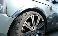 Range Rover III L322 2002–2012 Nerjaveče obrobe blatnikov (4 kosi) fotografija 1