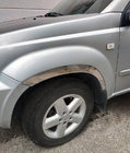 Nissan X-trail T30 2002–2007 Nerjaveče obrobe blatnikov (4 kosi) fotografija 1