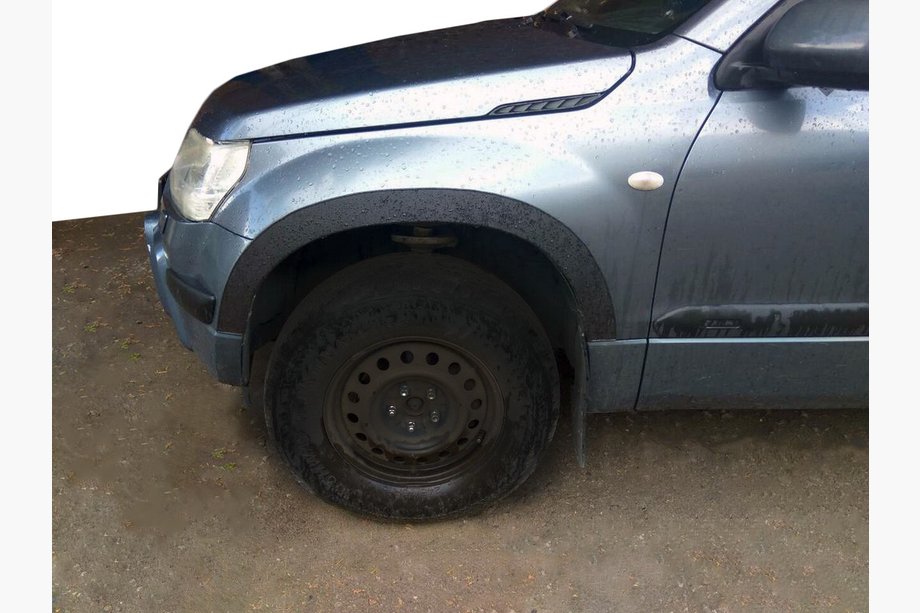 Suzuki Grand Vitara 2005–2017 Obrobe kolotekov (4 kosi, črne) Image