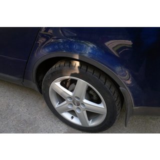 Obrobe kolotekov (4 kosi, črne) Audi A6 C5 1997–2001 fotografija 1