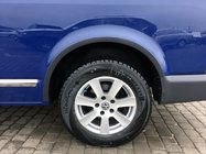 Volkswagen T5 Transporter 2003–2010 Obrobe kolotekov (6 kos, črne) fotografija 1