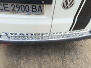 Volkswagen T5 Transporter 2003–2010 Nerjaveča zaščitna letev zadnjega odbijača s črnimi vložki fotografija 2