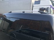 Volkswagen Caddy 2004–2010 Kromirane strešne sani Maxi, plastične nogice fotografija 1