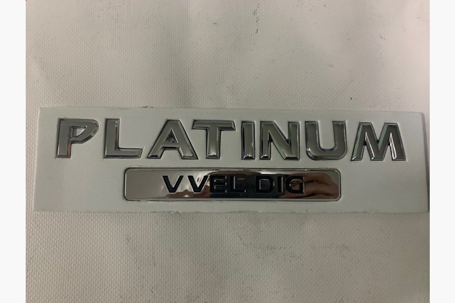 Nissan Patrol Y62 2010–2024 Emblem Platinum Image