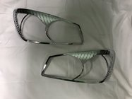 Kia Cerato 1 2004–2009 Kromirane obrobe žarometov (2 kosa, plastika) fotografija 1