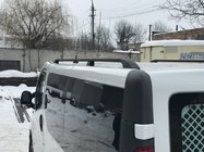 Renault Trafic 2001–2015 Črne strešne vzdolžne letve Kratka, plastične noge fotografija 1