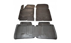 Kia Cerato 1 2004–2009 Gumijaste preproge z visokim robom (Autogumm) fotografija 1