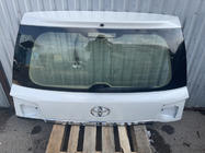 Toyota Land Cruiser 200 2007–2021 Zgornji pokrov prtljažnika 2016+ bel (rabljeno, original) fotografija 1