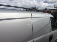 Fiat Doblo II 2010–2022 črne strešne letve Standardna, plastične noge fotografija 6
