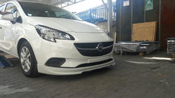Opel Corsa E 2015–2019 Sprednji spodnji lip spojler (za lakiranje) fotografija 1