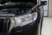 Toyota Land Cruiser Prado 150 2009–2023 Veke za žaromet (voznikova stran, za reflektorski žaromet) fotografija 1