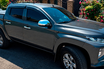 Mitsubishi L200 2015–2024 Vetrni deflektorji oken s kromirano letvico (4 kos, Niken) fotografija 1