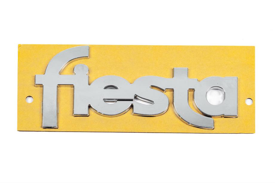 Ford Fiesta 1995–2001 Napis Fiesta YS61B42528AA (117 mm x 52 mm) Fotografija 1