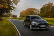 Pregled mestne kombilimuzine Mazda 2 Hybrid fotografija 1