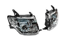 Mitsubishi Pajero Wagon IV 2006–2021 OEM sprednji žarometi (2 kos) fotografija 2