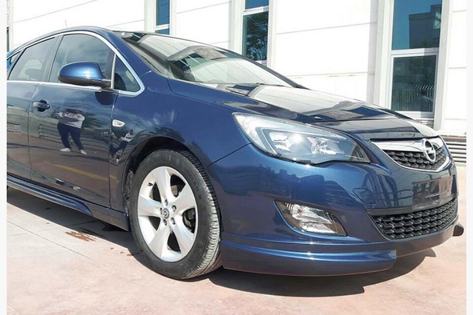 Opel Astra J 2009–2015 Sprednji lip spojler odbijača DPT V-2 (za barvanje) Fotografija 3