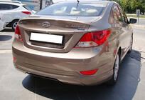 Hyundai Accent 2011–2017 Zadnji difuzor DPT (sijajno črna) fotografija 3