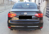 Volkswagen Jetta 2011–2018 Zadnji difuzor DPT (2014-2018, črna visok sijaj) fotografija 1