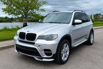 BMW X5 E70 2007–2013 Sprednji lip spojler odbijača (2010-2013, za lakiranje) fotografija 1