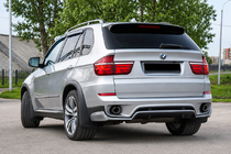 BMW X5 E70 2007–2013 Nastavek zadnjega odbijača – difuzor (2010-2013, za lakiranje) fotografija 1