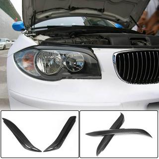 Trepalnice za žaromete (karbon) BMW serija 1 E81/E82/E87/E88 2004–2011 fotografija 1
