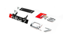 Audi Q7 2015–2026 Komplet emblemov za masko fotografija 1