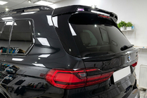 BMW X7 G07 2019– Spodnji spojler V1 (Črna visok sijaj) fotografija 1