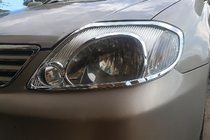 Toyota Corolla 2002–2007 Pokrovi žarometov V1 (2002-2004, 2 kosa, plastika) fotografija 1