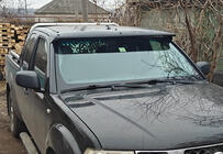 Nissan Navara 2006–2015 Sončni vizir za vetrobransko steklo (na okvirju) fotografija 1