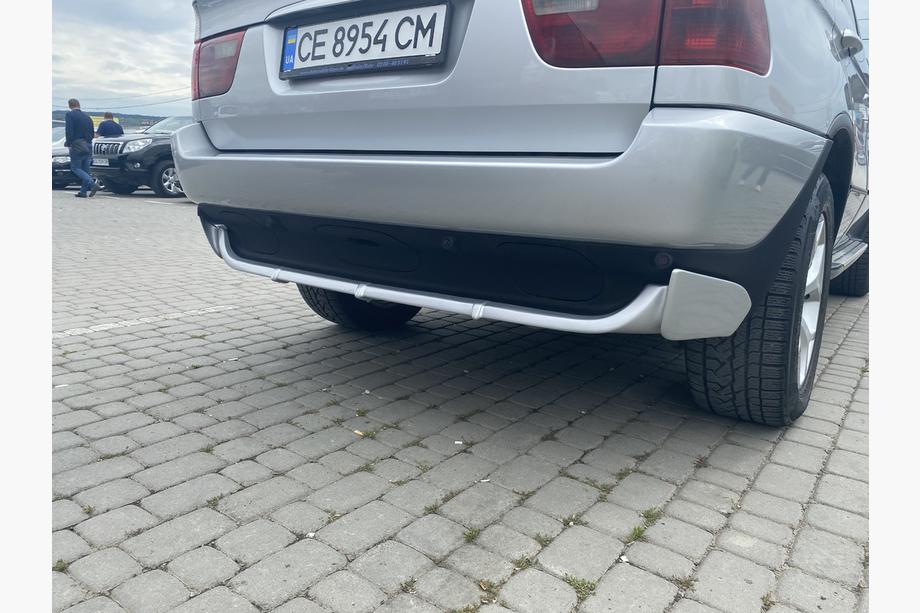 BMW X5 E53 1999–2006 Obloga zadnjega odbijača (za lakiranje) Fotografija 1