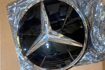 Mercedes GLE/ML class W166 2011–2018 Razprodaja: Sprednji emblem pod steklom, kromiran rob a0008880111 (za GLE) fotografija 2