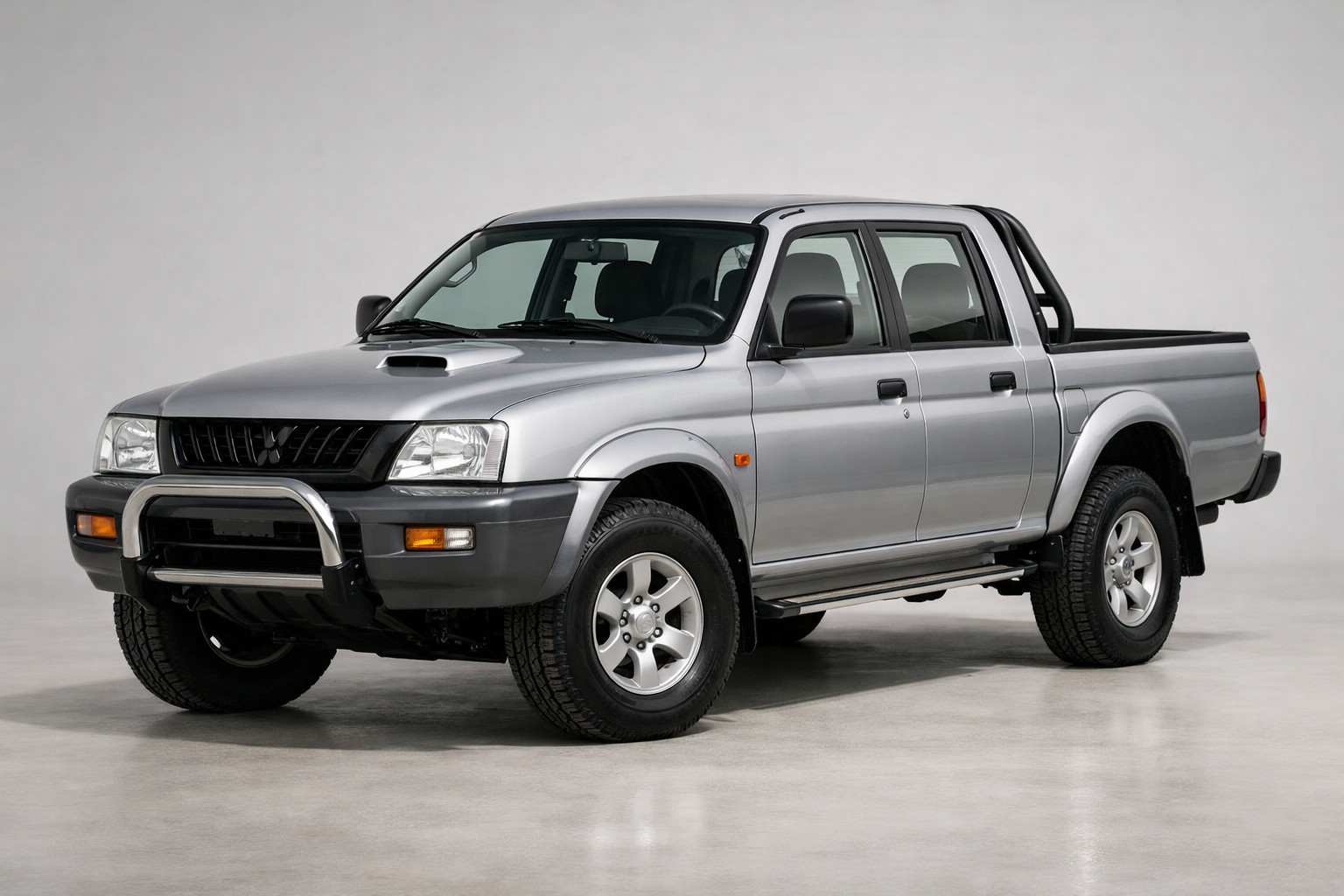 Pregled Mitsubishi L200 1996–2006: starošolski pick-up brez blišča