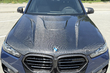 BMW X5 G05 2018 → X5M 2025: celovita prenova s karbonskim bodykitom in M-volanom fotografija 11