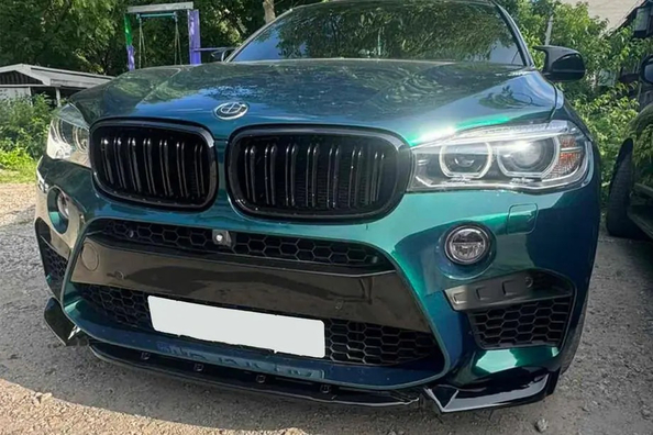 Tuning BMW X5 F15: pokrovi ogledal, spojler in sprednji lip Fotografija 11