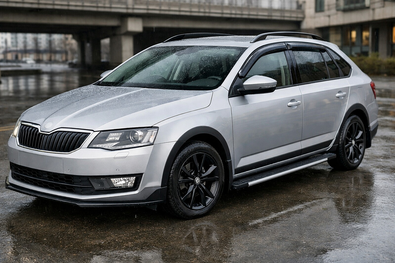 Začetna nadgradnja Skoda Octavia A7: mesto, dež in čisti pragovi