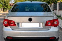 Volkswagen Jetta 2006–2011 DPT spojler (črna visok sijaj) fotografija 1