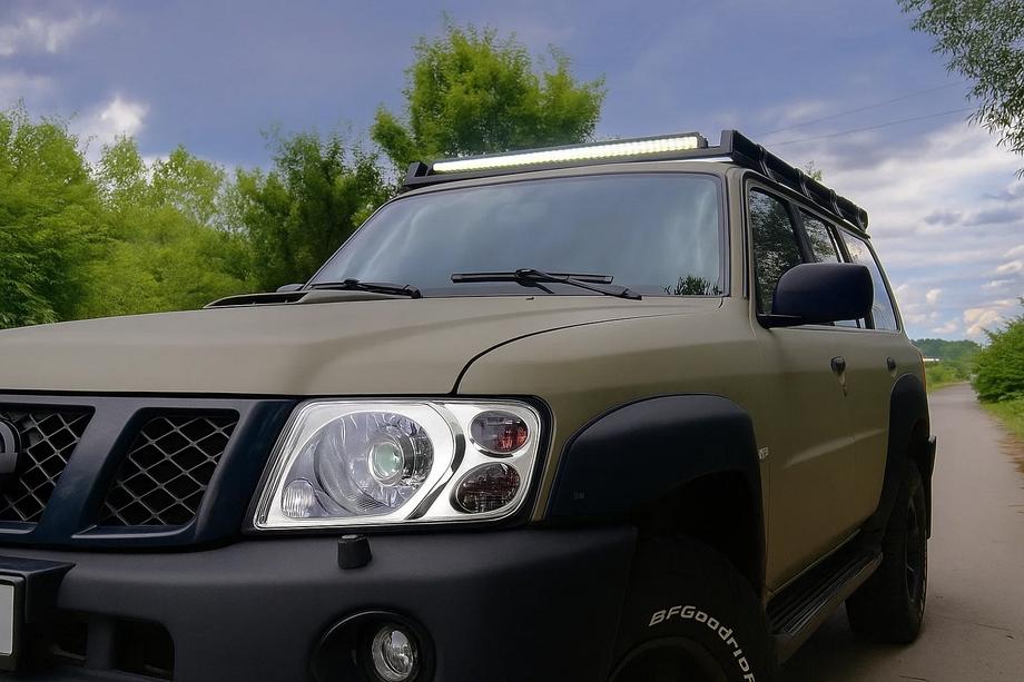 Nissan Patrol Y61 1997–2011 Kromirani pokrovi žarometov (2001-2004, 2 kos.) Fotografija 1