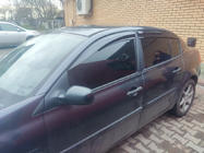 Renault Megane II 2004–2009 Vetrni deflektorji oken SD (4 kos, Perflex Sport) fotografija 1