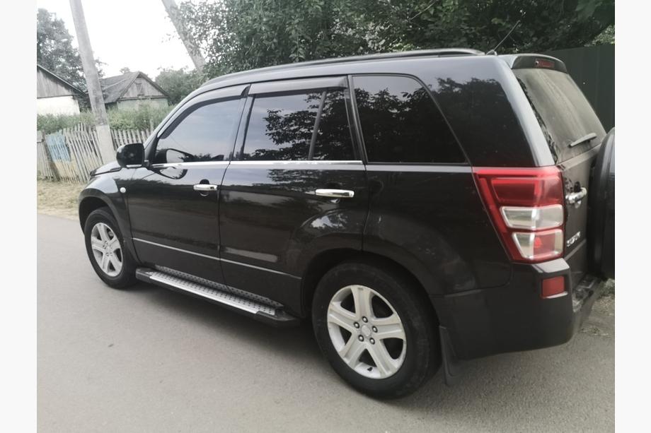Suzuki Grand Vitara 2005–2017 Okenske obrobe (4 kosi, nerjavno jeklo) Image