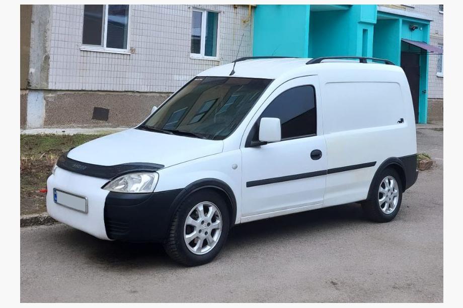 Opel Combo 2002–2012 Črne strešne vzdolžne letve Plastične pritrdilne noge Image