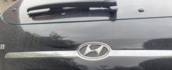 Hyundai Tucson JM 2004– Emblem (samolepilna nalepka, 125 mm (65 mm)) fotografija 2
