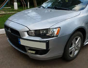 Mitsubishi Lancer X 2008– Nosilec registrske tablice (plastika) Mat črna fotografija 1