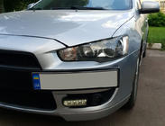 Mitsubishi Lancer X 2008– Nosilec registrske tablice (plastika) Mat črna fotografija 2