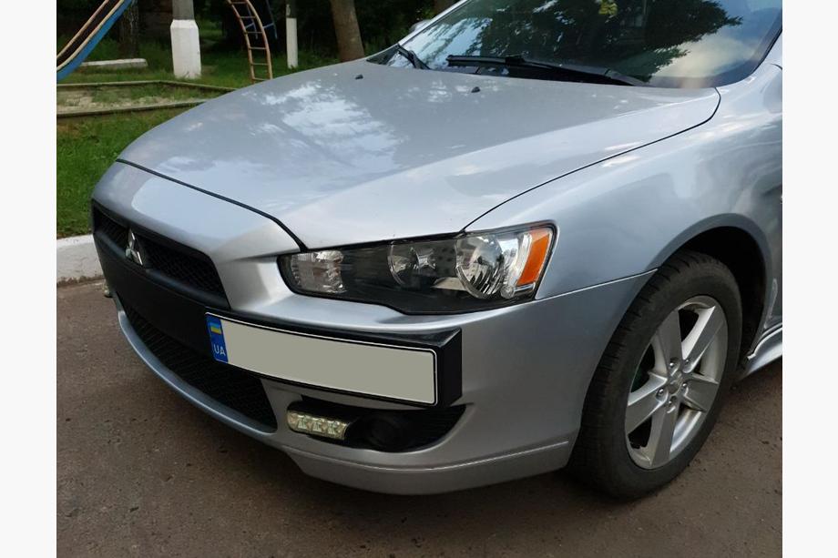Mitsubishi Lancer X 2008– Nosilec registrske tablice (plastika) Mat črna Image