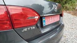 Volkswagen Jetta 2011–2018 Letvica nad registrsko tablico OmsaLine (nerjavno jeklo) fotografija 1