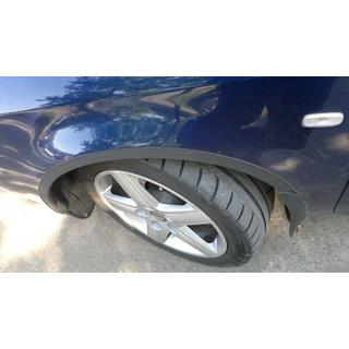 Obrobe kolotekov (4 kosi, črne) Audi A6 C5 1997–2001 fotografija 3