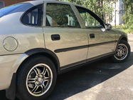 Opel Vectra B 1995–2002 Obrobe kolotekov (4 kosi, črne) ABS plastika fotografija 1